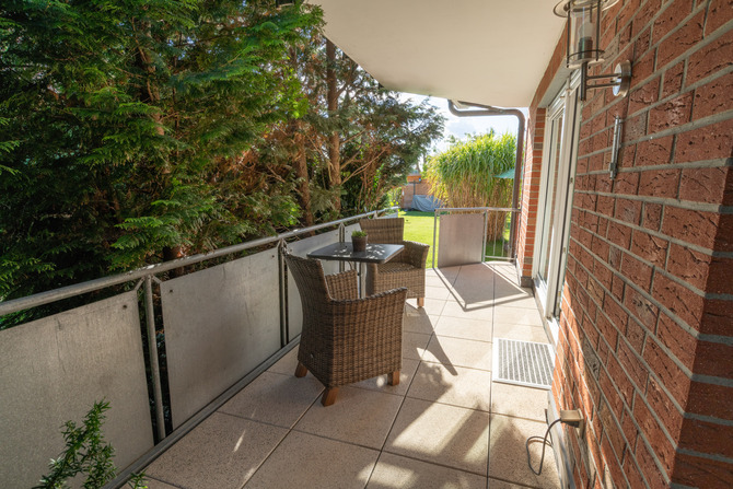 Ferienwohnung in Feldhusen - Diana EG Terrasse - Blick Balkon Garten