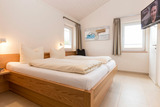 Ferienhaus in Fehmarn - Wellnesshaus "Welle" eingezäunt - Bild 8