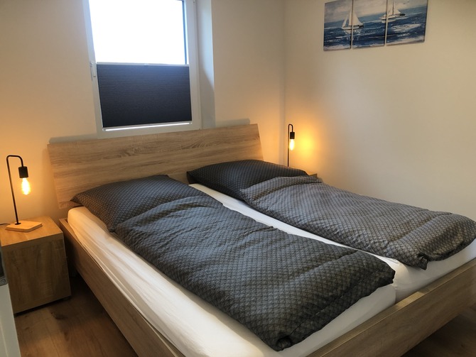 Ferienhaus in Fehmarn OT Gammendorf - Feriendomizil SeeSand 2 - Schlafzimmer mit Doppelbett